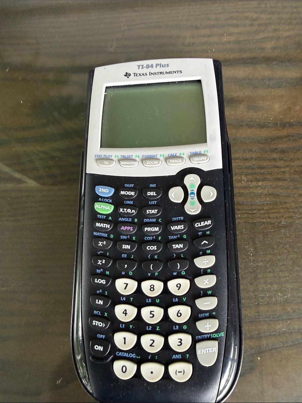Texas Instruments TI-84 Plus Graphing Calculator in Black and White